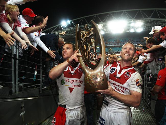 Dean Young and Ben Hornby with the premiership trophy.