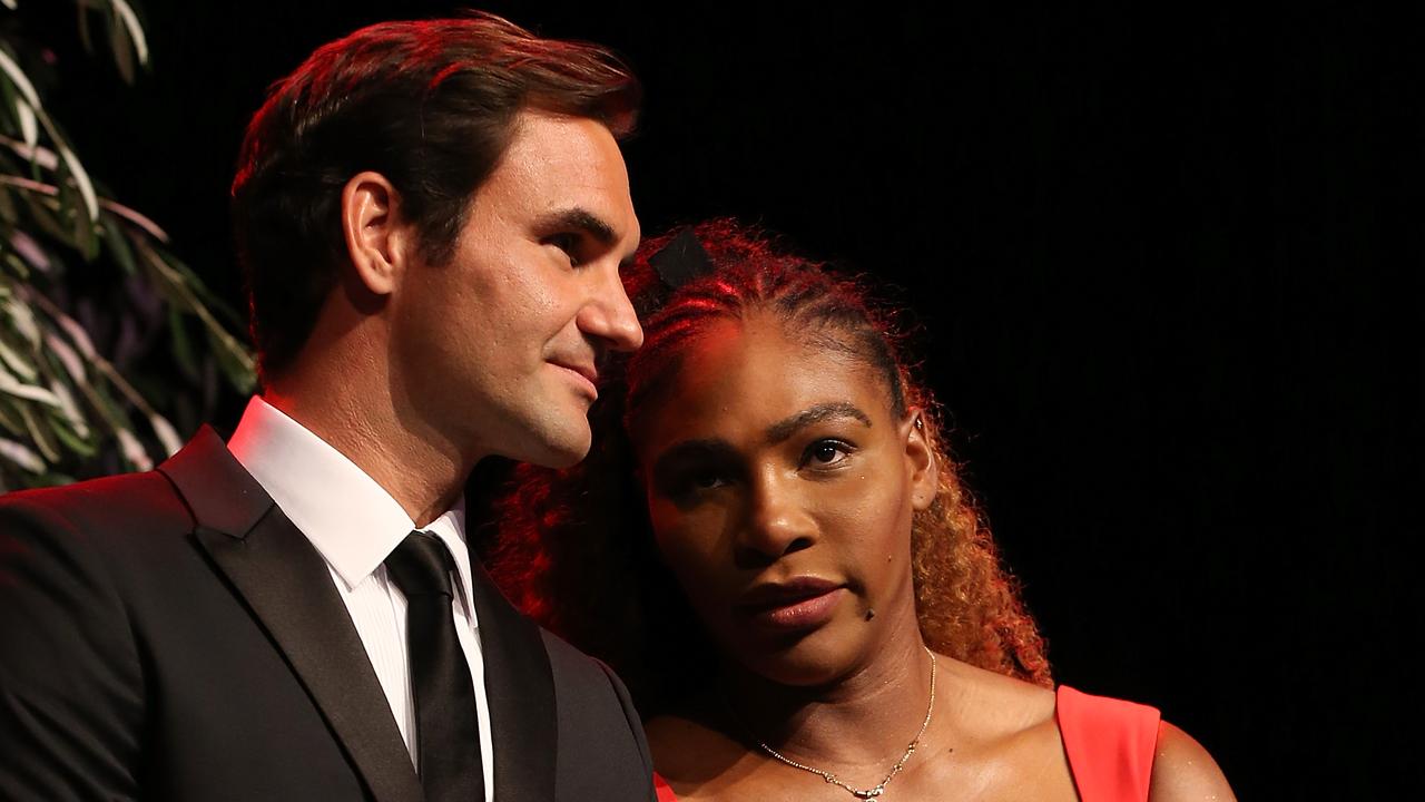 Roger Federer and Serena Williams share a moment on stage at the Hopman Cup New Years Eve Gala.