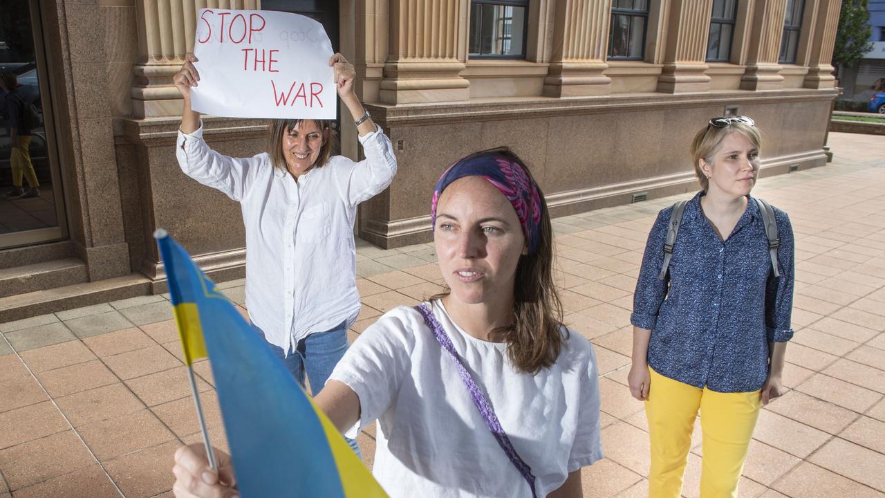 (from left) Elizabeth Addie, Gaby Addie and Anna Yevdokimov bring the plight of Ukraine to Toowoomba streets. Thursday, March 24, 2022. Picture: Nev Madsen.