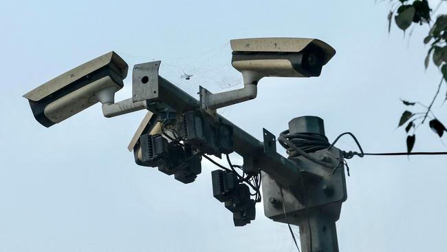 A set of cameras, including closed circuit television cameras, can aid in facial recognition. Picture: AFP