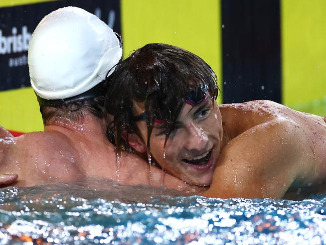 The other qualifier in the 50 metres freestyle, Ben Armbruster, congratulates McEvoy. Picture: Quinn Rooney/Getty Images