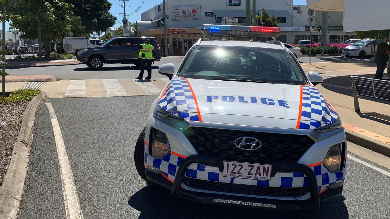 Police direct traffic away from Macalister St in the Mackay CBD due to a structure fire. Mackay police generic. Picture: Rae Wilson