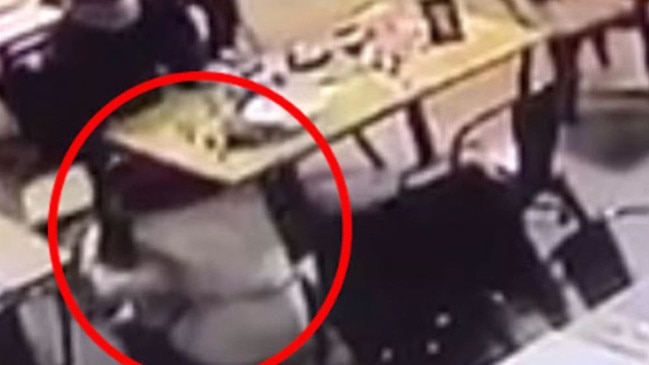 A mother and young girl hide underneath a table as thugs rampage through a Caroline Springs restaurant.