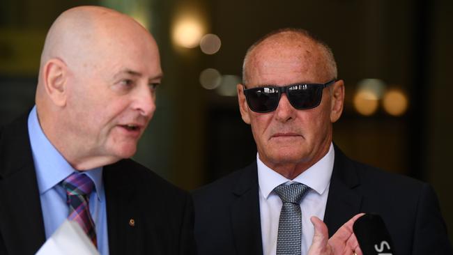 Chris Dawson (right) outside Downing Centre Local Court today. Picture: AAP