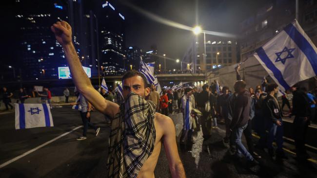 The Tel Aviv protest swells on Saturday night to about 200,000 demonstrators. Picture: AFP