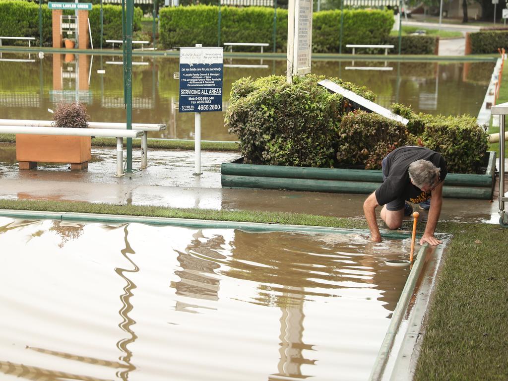 Camden a day after another flood in the area in two weeks . The Camden sports club and Bowling club flooded again after most repairs from the last flood were being completed.