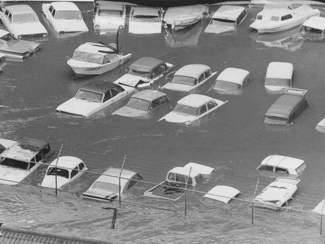 Some of the 400 cars damaged by the floodwaters.