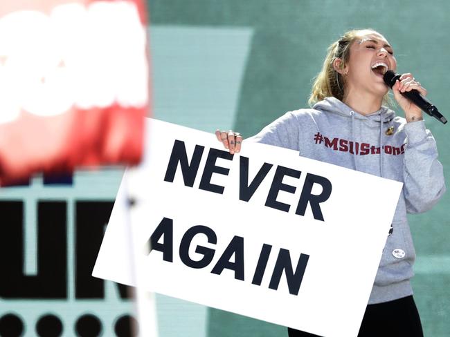 Miley Cyrus performs as close to a million people attended the protest in Washington alone. Picture: Chip Somodevilla/Getty Images/AFP