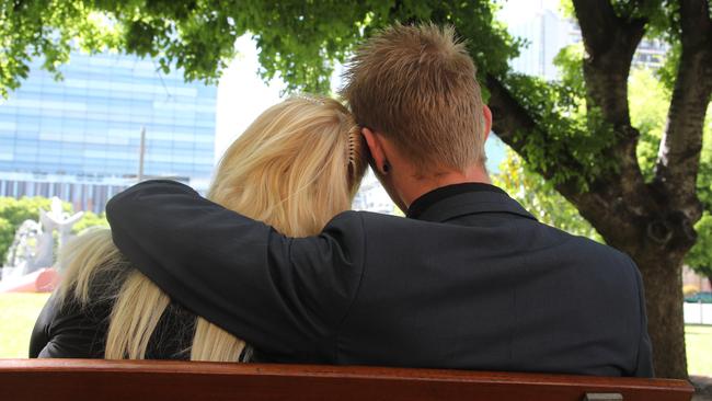 Damien, right, and his mother Celeste, left, outside the District Court. Picture: Dean Martin