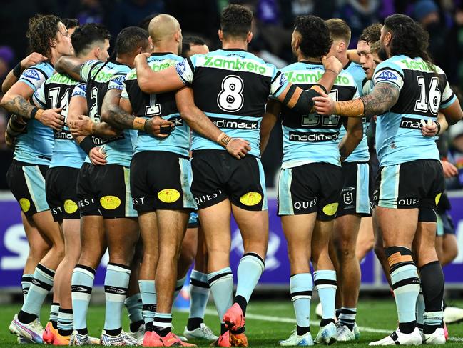 MELBOURNE, AUSTRALIA - SEPTEMBER 14: Sharks players perform a huddle after a Storm try during the NRL Qualifying Final match between Melbourne Storm and Cronulla Sharks at AAMI Park on September 14, 2024 in Melbourne, Australia. (Photo by Quinn Rooney/Getty Images)