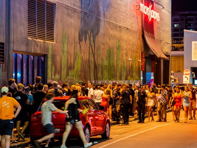 Mitchell St in Darwin was abuzz to celebrate the end of 2020. There was a visible police presence along the party strip.   Picture: Che Chorley