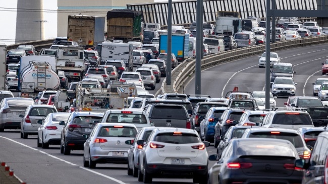 Traffic is banked up heading onto the West Gate Bridge on Friday afternoon as Melburnians are able to travel to regional Victoria after lockdown restrictions eased. Picture: NCA