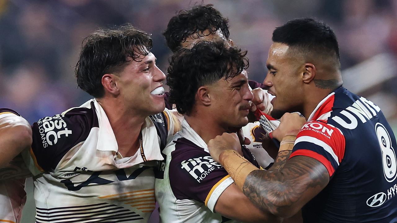 LAS VEGAS, NEVADA - MARCH 02: SpencerÃ&#130;Â Leniu (r) of the Roosters exchanges heated words with KotoniÃ&#130;Â Staggs of the Broncos during the round one NRL match between Sydney Roosters and Brisbane Broncos at Allegiant Stadium, on March 02, 2024, in Las Vegas, Nevada. (Photo by Ezra Shaw/Getty Images)