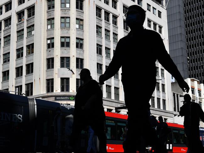 With restrictions being eased across Australia and in New South Wales the numbers of shoppers and workers are slowly increasing in the CBD in Sydney, Monday, May 11, 2020. The Federal Government has announced stage one of the easing of restrictions, that were put in place to combat the COVID-19 pandemic, with Australian states given the autonomy to bring introduce the stage one restrictions as they deem suitable. (AAP Image/Dean Lewins) NO ARCHIVING