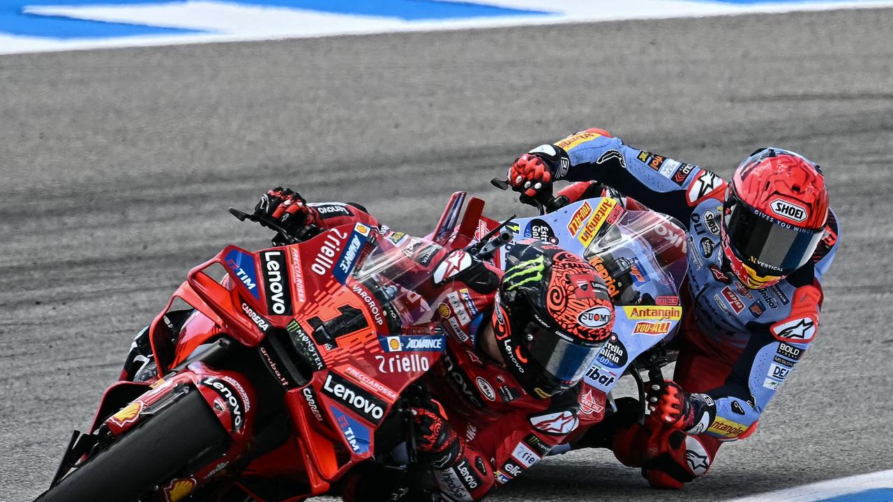 TOPSHOT - Ducati Italian rider Francesco Bagnaia (Front) and Ducati Spanish rider Marc Marquez compete during the MotoGP Spanish Grand Prix race at the Jerez racetrack in Jerez de la Frontera on April 28, 2024. (Photo by JORGE GUERRERO / AFP)