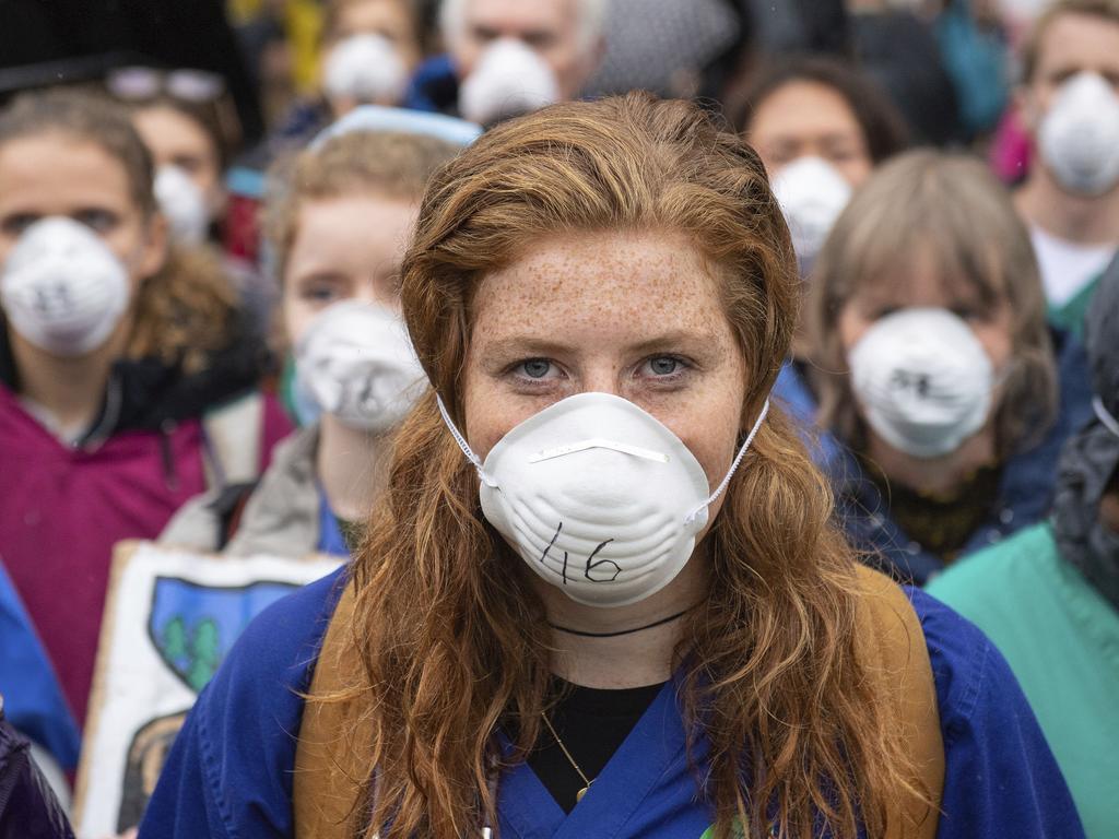 Doctors for Extinction Rebellion (XR) at Jubilee Gardens, London. Picture: Dominic Lipinski/PA via AP