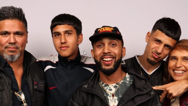 Delvene and Che Cockatoo-Collins with their family. Both have played roles in fighting domestic violence and calling out racism as well as creating art and designing fashion on Minjerribah.