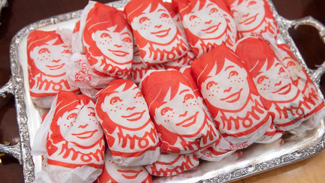 Residents of Sydney, Melbourne and Brisbane would be the first in the country to get their hands on the chain’s famous burgers, fries and frosty desserts. Picture: Saul Loeb/AFP