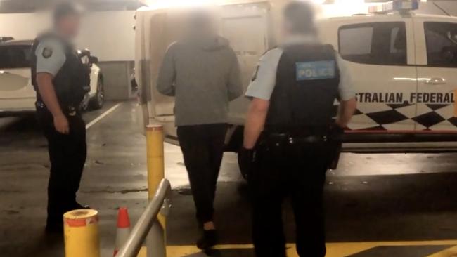 A man being arrested by police over an alleged Sydney Airport drug import scheme. Picture: Supplied