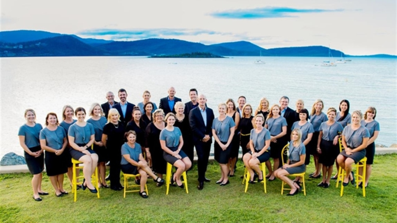 Ray White Whitsunday principal Mark Beale said it was a good time to buy in the Whitsunday property market. Pictured is the Ray White Whitsunday team. Photo: Contributed