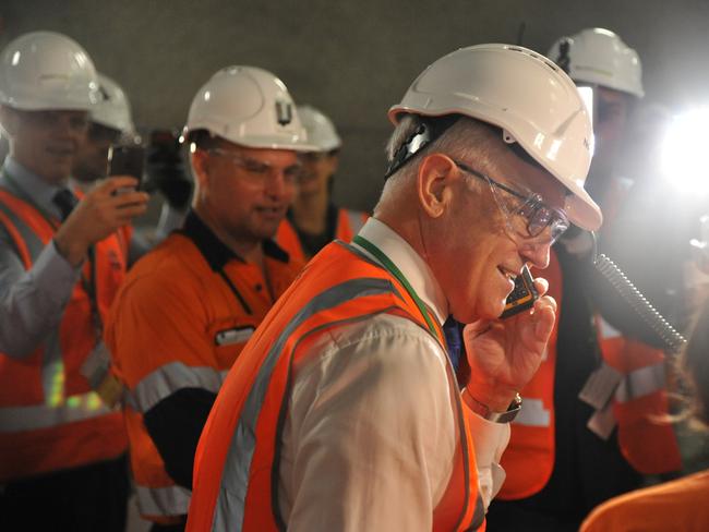 PM Malcolm Turnbull signals for the go ahead of the breakthrough in southern compound. Pictures: Jake McCallum