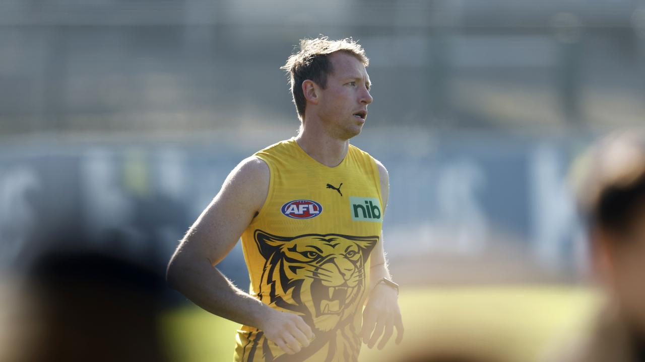 Injured Richmond co-captain Dylan Grimes jogs laps of Punt Rd Oval. Picture: Getty Images