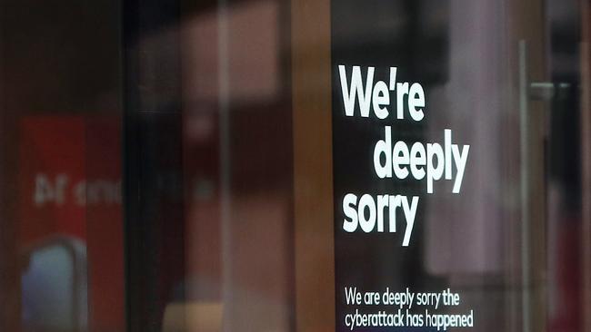 An Optus public service message is displayed inside an Optus store. Picture: Brendon Thorne/Getty Images