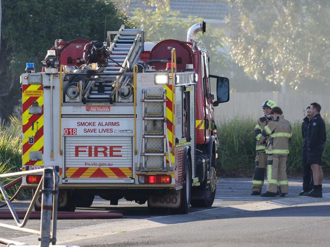 Firefighters at the scene on Saturday morning. Picture: David Crosling