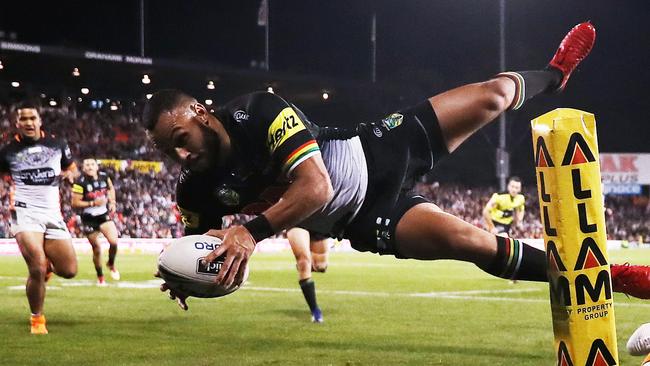 Penrith's Tyrone Phillips scoring a try during the NRL match between the Penrith Panthers and Wests Tigers at Penrith Stadium. Pic: Phil Hillyard