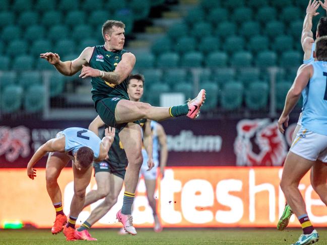 Tasmania vs NSW / ACT at University of Tasmania Stadium on Saturday 20th July 2024. Sam Siggins takes a shot for Tasmania.Picture: Linda Higginson / AFL Tasmania