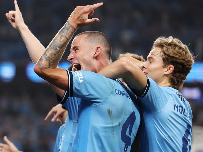 SYDNEY, AUSTRALIA - NOVEMBER 23: Jaiden Kucharski of Sydney FC celebrates scoring a goal with team mates during the round five A-League Men match between Sydney FC and Western Sydney Wanderers at Allianz Stadium, on November 23, 2024, in Sydney, Australia. (Photo by Mark Metcalfe/Getty Images)