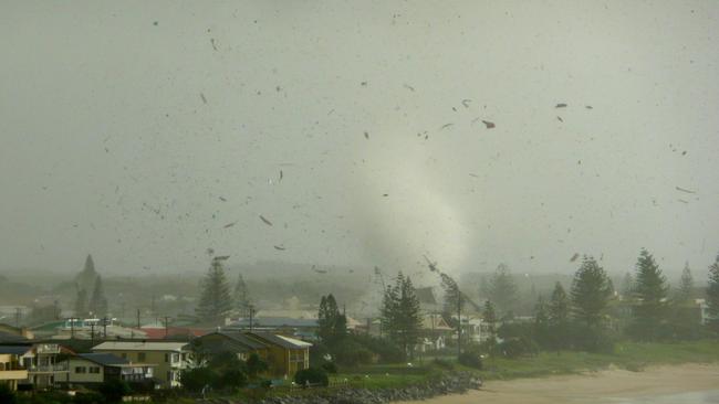 The water spout making landfall at Lennox Head before carving a path of destruction through the town. June 2010Photo Contributed John Green
