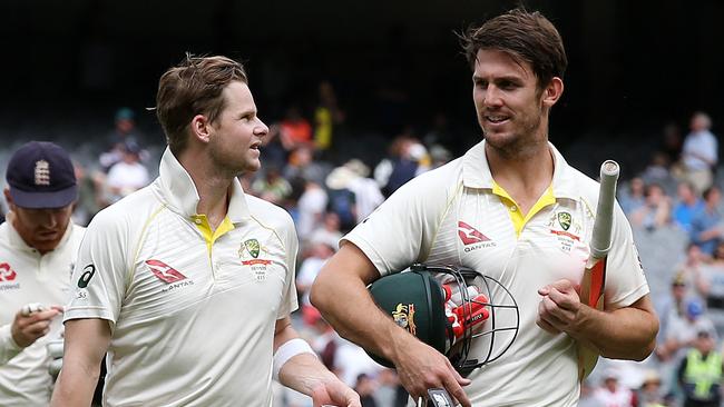 Steve Smith and Mitchell Marsh walk off the MCG after salvaging a draw. Picture: Michael Klein