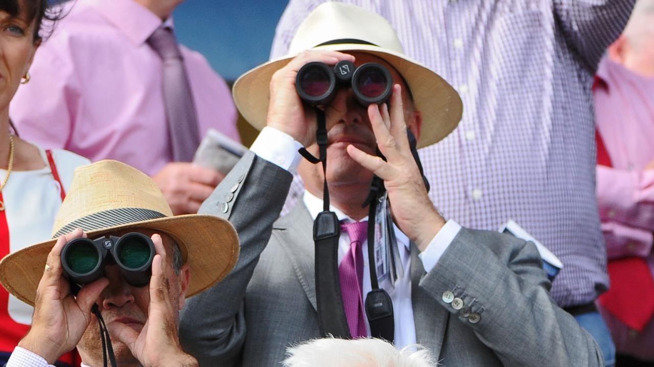 Racegoers with their eyes on the prize. Picture: Getty Images