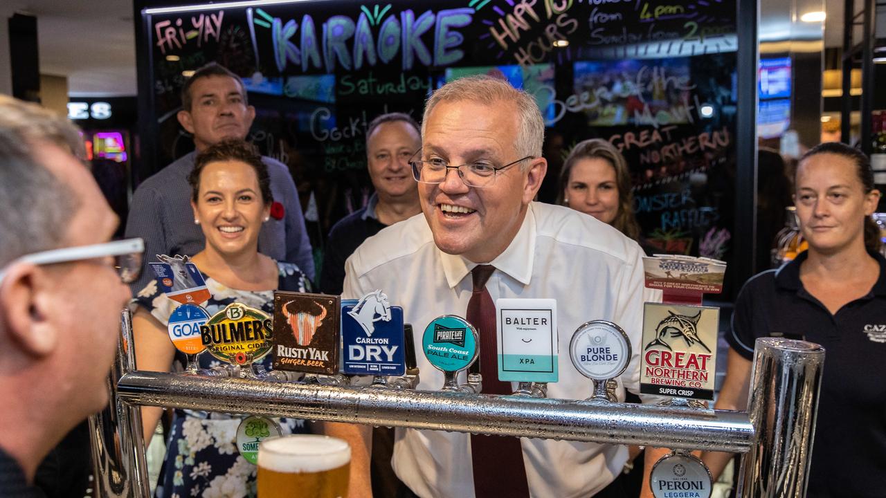 Darwin locals know how to pull a beer, and Scott Morrison’s technique won their approval. Picture: Jason Edwards