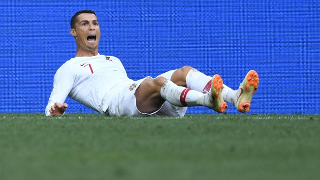 Portugal's forward Cristiano Ronaldo called for a VAR review after appearing to dive.