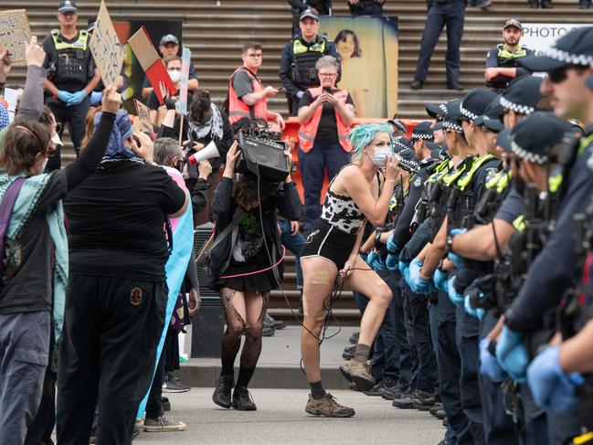 Trans rights activists target a Women will Speak rally in Melbourne in March. Picture: Tony Gough