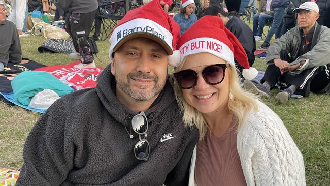 Doncaster's Troy and Danka Bereau enjoy Manningham's 2022 Carols at Ruffey Lake Park in Doncaster.