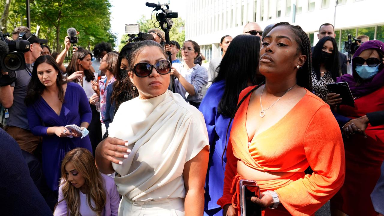 Some of the alleged victims talk to the press following the sentencing hearing on June 29, 2022. Picture: Timothy A. Clary/AFP