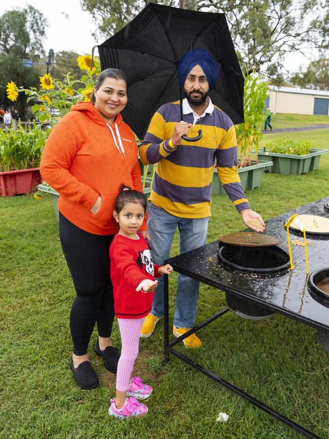 Gurbani Grewal with her mum Aman Grewal and dad Gurkhushdeep Grewal at the 2022 Toowoomba Royal Show, Saturday, March 26, 2022. Picture: Kevin Farmer