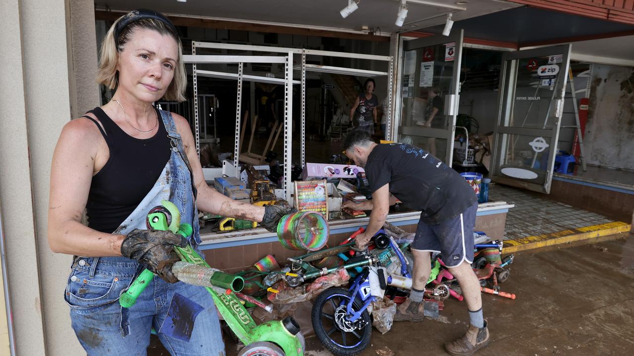 Carmel and Carey Horner operate the Toy Kingdom store on Woodlark St and had all of their stock ruined by the flood waters. Picture: Toby Zerna