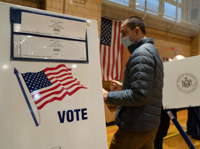 People vote at at Public School 33 in Chelsea, New York. Picture: AFP