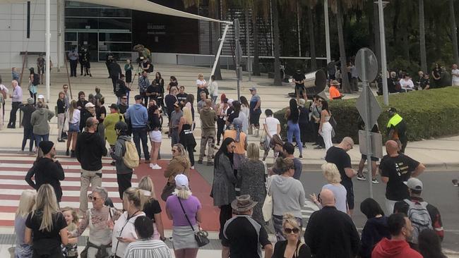 The "silent" Covid-19 protest outside Gold Coast City Council Chambers on Tuesday morning. Picture: Kyle Wisniewski