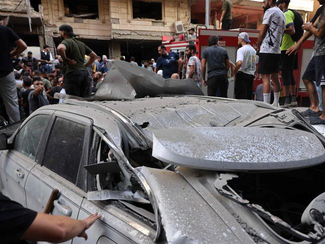 People check the damage following an Israeli strike in Beirut. Picture: AFP.