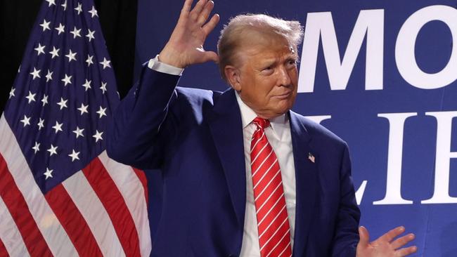 Donald Trump dances on the stage at a Washington rally. Picture: Getty Images via AFP.