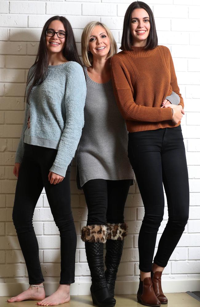 Mother Kelli Foran, centre, with her daughters, Bella and Maddi. Picture: Dean Martin