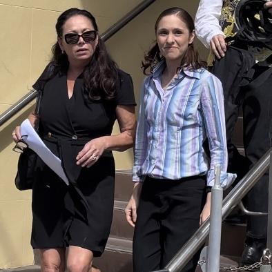 Heidi Ward (left) leaves Mackay courthouse with murder accused Jessica Blinda Polsoni Hanbury after a part heard committal. Picture: Fergus Gregg