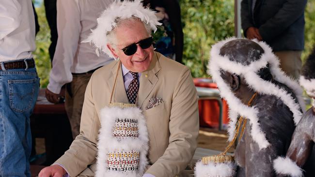 2018: His Royal Highness Prince Charles is welcomed to country with a sacred 'Wuyal' ceremony, which will reveal the Malka (feather) string that connects the Rirratjingu people to their land. Picture: Michael Franchi