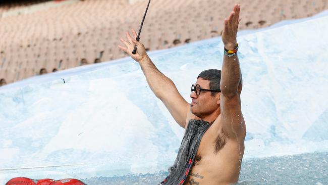 Aboriginal football legend Jeff Farmer stripped off for his trip down the slide. Picture Michael Willson/AFL Photos