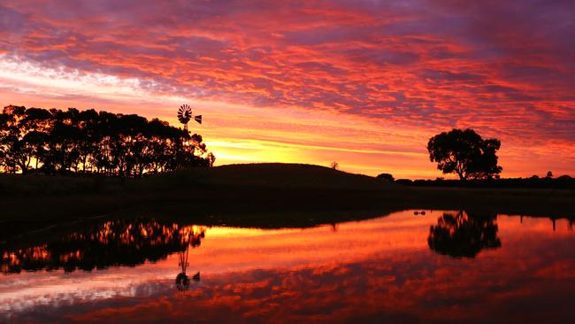 Sun goes down: Kiri Handreck's photo of her Byaduk farm at sunset is an example of reflection photography, one of her favourite types of shots to capture. Picture: Kiri's Images